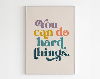 May include: A motivational poster with a beige background and the text "You can do hard things." in a colorful retro font.