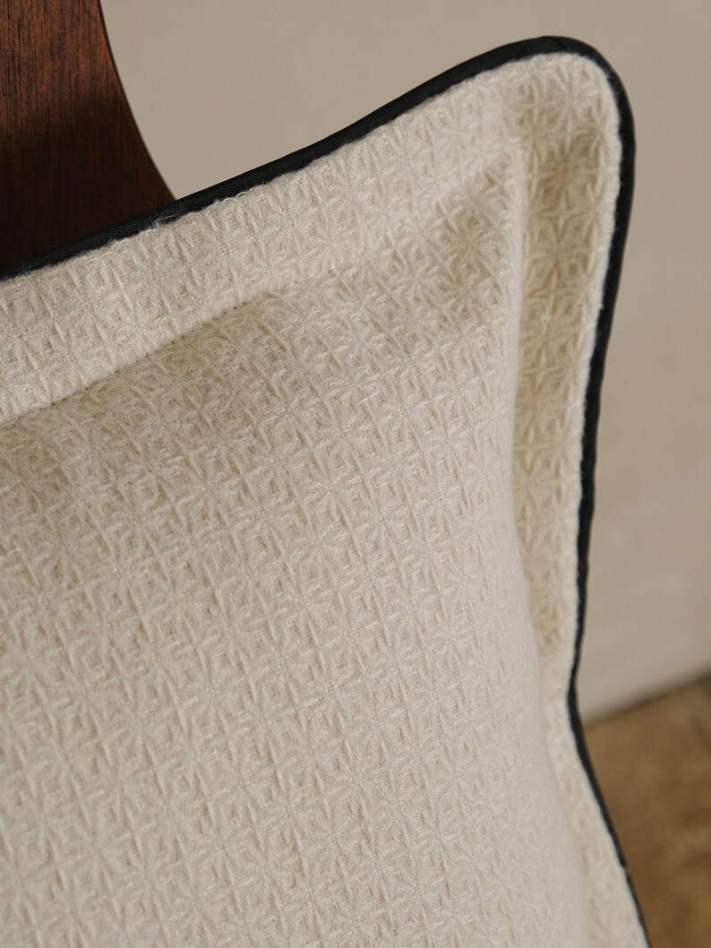 pillow with black piping