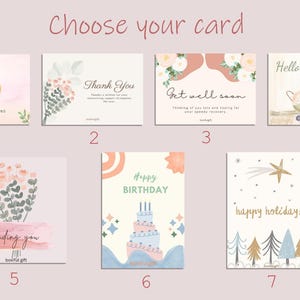 May include: A set of 7 different greeting cards with watercolor illustrations. The cards feature a pumpkin, flowers, a cake, a baby carriage, a star, and trees. The cards are numbered 1 through 7.