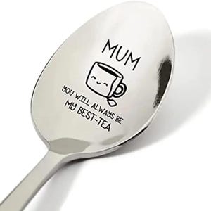 May include: A stainless steel spoon with the text "MUM you will always be my best-tea" engraved on it. The text is accompanied by a cartoon image of a teacup with a smiling face.