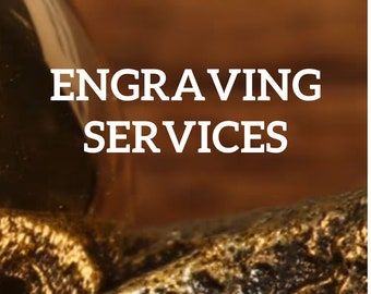 May include: Engraving services offered. The image shows a close-up of a gold-colored metal object.