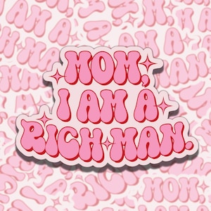 May include: Pink and red sticker with the text "MOM, I AM A RICH MAN." in a retro font style. The sticker has a white border and a glittery effect.
