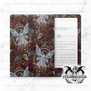 May include: A decorative Kindle cover featuring a repeating pattern of fairies, skulls, and flowers in a dark color palette. The cover has a flap that opens to reveal the Kindle screen with text. The cover also has the text "Sticky Sadness".