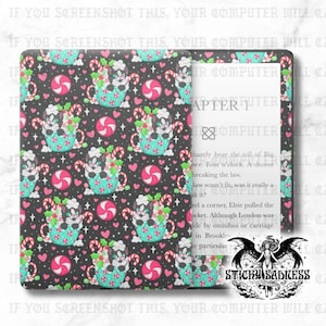 May include: Dark grey e-reader cover featuring a repeating pattern of cartoon cats in teal mugs, candy canes, and pink hearts. The e-reader displays text from a book. The cover has the text "STICKY SADNESS".