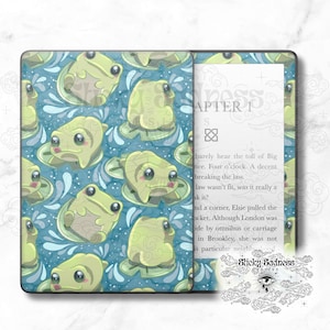 May include: A blue and green patterned Kindle Paperwhite e-reader skin with a frog design. The skin has a repeating pattern of frogs sitting on lily pads with water droplets around them. The text "Sticky Sadness" is visible on the right side of the image.