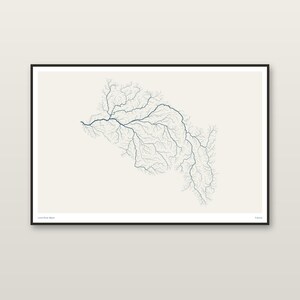 May include: A framed horizontal print featuring a detailed blue line map of the Loire River basin against a solid off-white background. The intricate network of tributaries branches out across the center, with small text in the bottom corners.
