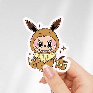 Pegatina de vinilo impermeable de Labubu Eevee, regalo de los monstruos, calcomanía de anime kawaii para computadora portátil, botella de agua, diario