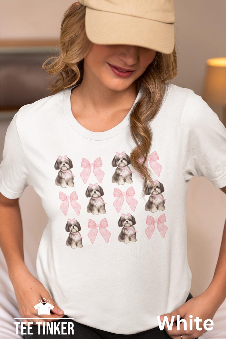 Show off your love for Shih Tzus with this adorable "Shih Tzu with Pink Bows" design! Available in T-Shirt, V-Neck, or Sweatshirt, this cute and playful graphic is perfect for Shih Tzu lovers who want to add a touch of sweetness to their wardrobe.