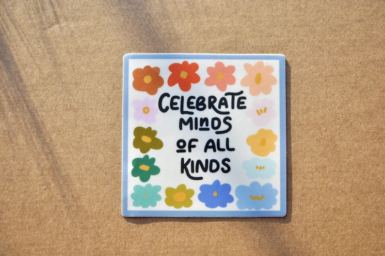 May include: A square sticker with a blue border and a white background. The sticker features a colorful floral design with the text "Celebrate Minds of All Kinds" in black.
