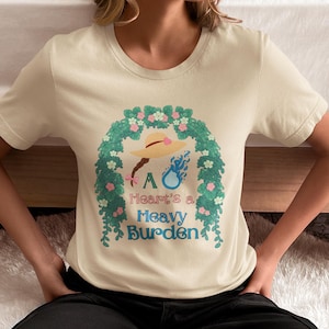 Howl&#39;s Moving Castle Inspired A Heart&#39;s A Heavy Burden Unisex Softstyle T-Shirt, Anime Shirt, Howl and Sophie Shirt, Calcifer Shirt.