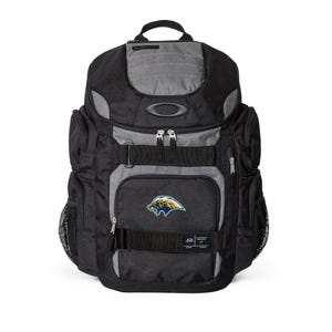 May include: Black and gray backpack with multiple compartments and a top handle. The backpack features a front pocket with a logo and a black strap. The Oakley logo is visible on the top. The backpack has a mesh side pocket.