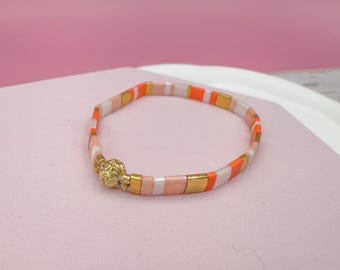 Chic bracelet with colorful glass beads and gold accents