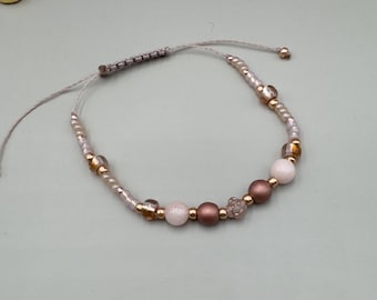 Rose quartz bracelet – handmade jewelry with glass beads and gold-colored accents – delicate adjustable women's bracelet