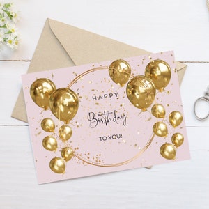 Puede incluir: Una tarjeta de cumpleaños rosa con globos dorados y confeti. La tarjeta dice "¡Feliz cumpleaños para ti!"