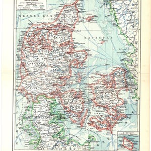 May include: An antique map of Denmark, featuring detailed geographical information. The map uses a color palette of beige, blue, green, and red to highlight land, water bodies, and political boundaries. Text in German is visible at the top, with the title "Dänemark."
