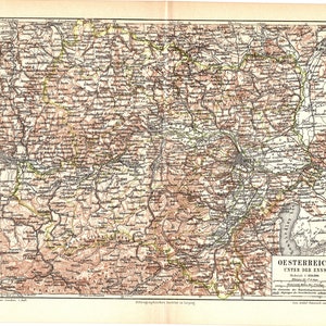 Könnte beinhalten: Eine alte Karte von Österreich, die die Region "Unter der Enns" mit detaillierter Topographie und Ortsnamen zeigt. Die Karte ist in Schwarz, Braun und Grün auf weißem Hintergrund gedruckt. Der Titel "Oesterreich Unter der Enns" ist in der unteren rechten Ecke gedruckt.