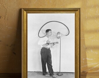 Actor Buster Keaton listens to his own voice to check how it will register for talking movies Vintage Framed Wall Art, Black - White, Sepia