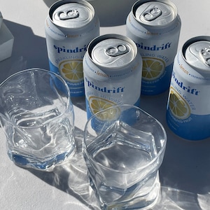 Unique wavy glass coffee cup, ideal for iced coffee and matcha lovers who enjoy Nordic-style drinkware.