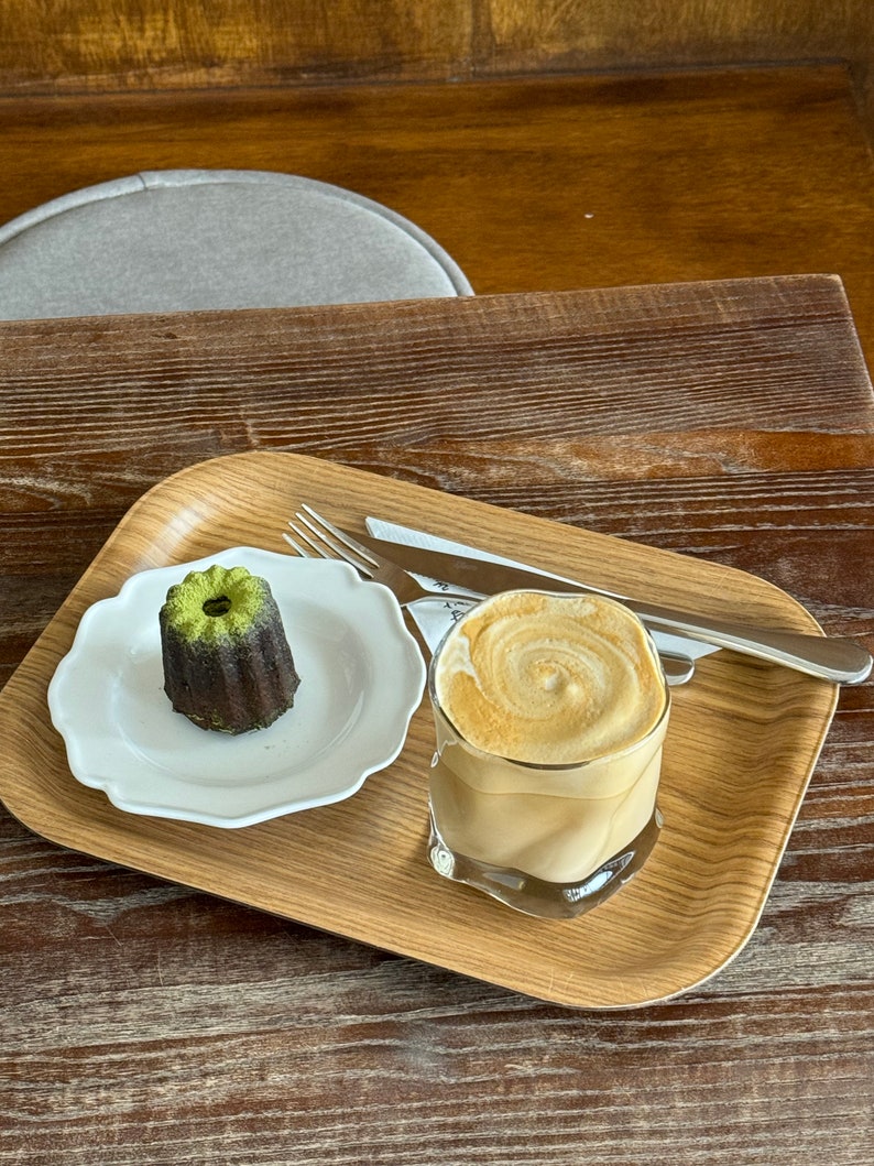 Unique handmade wavy glass cup for iced coffee, coffee, matcha, and cocktails, perfect as a stylish housewarming gift.