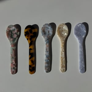 Colorful handmade acrylic dessert spoons, perfect for ice cream, sundaes, and sweet indulgences.