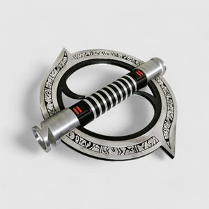 May include: A silver lightsaber with a black and silver handle and red accents. The lightsaber is attached to a circular, silver, metal ring with intricate designs.