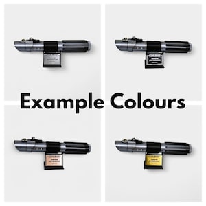 May include: Four lightsabers with silver and black handles, each displayed on a black stand with a nameplate. The nameplate reads "STAR WARS, ANAKIN SKYWALKER". The words "Example Colours" are in large black letters.
