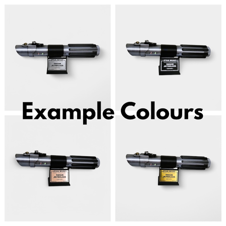 May include: Four lightsabers with silver and black handles, each displayed on a black stand with a nameplate. The nameplate reads "STAR WARS, ANAKIN SKYWALKER". The words "Example Colours" are in large black letters.