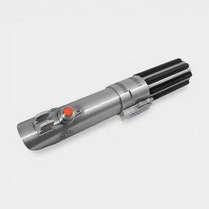 May include: A silver lightsaber prop with a black handle and a red button. The prop has a metallic finish and detailed design elements, suggesting a replica from a science fiction franchise. The lightsaber is a popular item for cosplay and collectors.