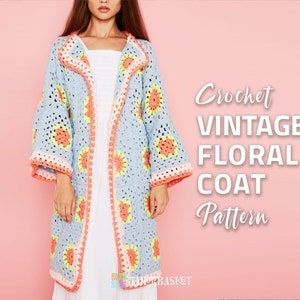May include: A crochet vintage floral coat pattern. The coat is light blue with a white and orange floral design. The model is wearing the coat over a white dress.