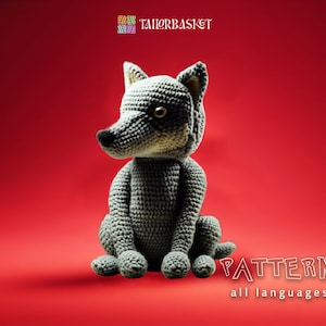 May include: A gray crocheted wolf plush toy sitting on a red background. The text "PATTERN all languages" is at the bottom of the image.