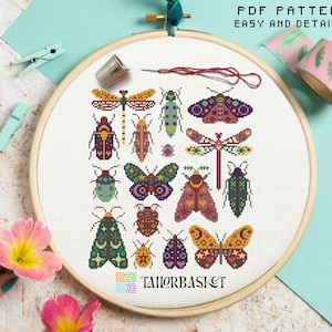 May include: A cross-stitch pattern featuring a variety of colorful insects, including butterflies, moths, dragonflies, and beetles. The pattern is displayed in a wooden embroidery hoop and includes the text "PDF PATTERN EASY AND DETAILED" and "TAILOR BASKET".