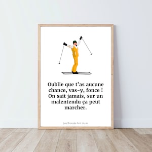 May include: A white poster with a cartoon illustration of a person skiing. The text on the poster reads: "Oublie que t'as aucune chance, vas-y, fonce! On sait jamais, sur un malentendu ça peut marcher. Les Bronzés font du ski."