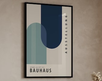 Könnte beinhalten: Ein gerahmtes Poster mit einem geometrischen Design in Blautönen und Grün. Das Poster zeigt den Text "AUSSTELLUNG" und "BAUHAUS" sowie das Datum "WEIMAR - JULI-SEPT. 1923".