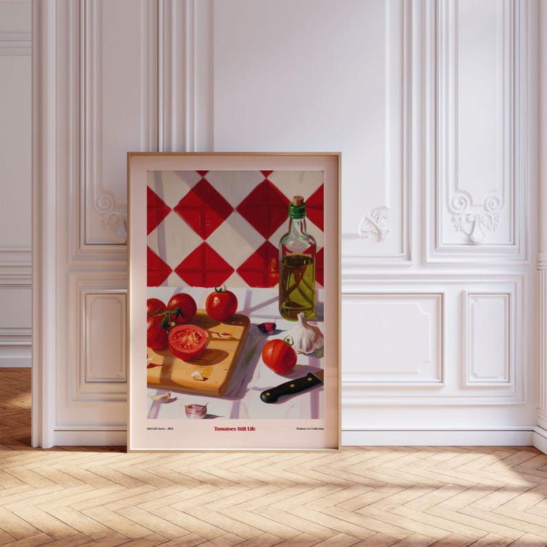 May include: A framed painting of a still life with red tomatoes, a bottle of olive oil, garlic cloves, and a knife on a wooden cutting board. The background is a red and white checkered tile pattern. The painting is titled "Tomatoes Still Life".