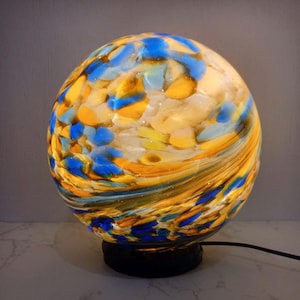 Handcrafted Golden Swirl Glass Sphere Lamp: Artisan Ambient Light