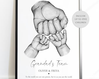 May include: A black and white framed print featuring a pencil-style illustration of one large adult fist bumping two smaller children's fists. The text reads: Grandad's Team, OLIVER & FREYA, and To the world you are one person, but to us you are the world.