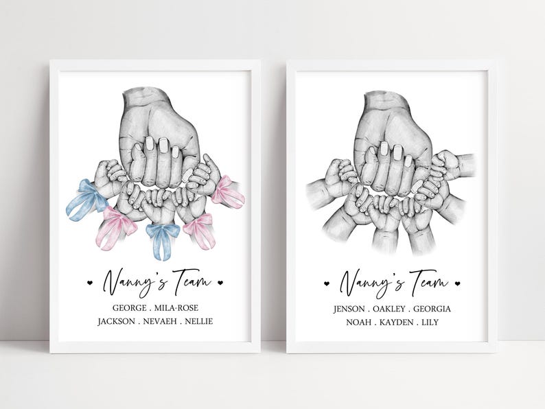 May include: Two framed prints featuring a central adult hand holding multiple baby hands. The left print includes blue and pink ribbons on the baby wrists. Both prints display the text Nanny's Team followed by a list of names in black ink.