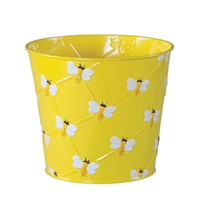 May include: A yellow metal bucket with a lattice pattern and embossed bee designs. The bucket has a slightly flared shape and a smooth, glossy finish. The bees are white and yellow, adding a touch of whimsy to the design. The bucket is suitable for various uses.