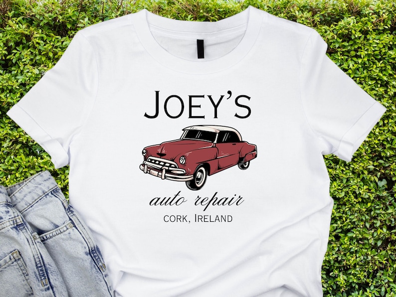 May include: White t-shirt with a red vintage car graphic and the text "JOEY'S auto repair CORK, IRELAND".