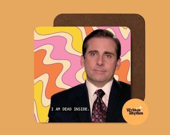 May include: A square coaster featuring a portrait of a man in a dark suit and patterned tie against a wavy background of pink, orange, and yellow stripes. The text "I AM DEAD INSIDE." is printed in white at the bottom left of the image.