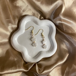 “Mother-of-pearl” earrings