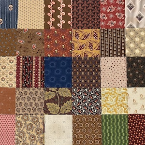 May include: A patchwork quilt fabric collection featuring thirty-six square swatches with diverse patterns including floral, geometric, striped, and botanical motifs in a color palette of brown, tan, red, blue, yellow, green, and cream.