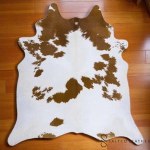 Handmade Cowhide Rug: Natural Black and White Accent Rug