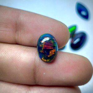 AAA Black Fire Opal Cabochon: Ethiopian Gemstone (12.5x9 MM)