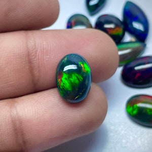 AAA Ethiopian Black Opal Cabochon: Galaxy Fire Gemstone (12.5x9.20 MM)