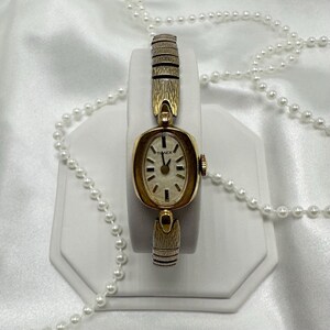 Gold 1979 Timex Wind-Up Watch with Oval Dial