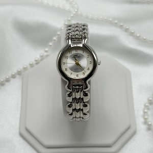 Silver Fabergé Watch with Gold Hands