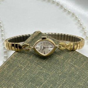 Dainty Gold Germinal Voltaire Wind-Up Watch