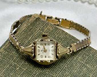 Dainty 1959 10k RGP Bulova With Blue Hands - Etsy display picture 1