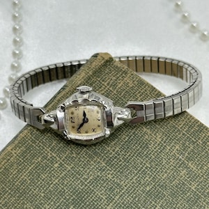 Dainty 1959 10k RGP Bulova with Blue Hands